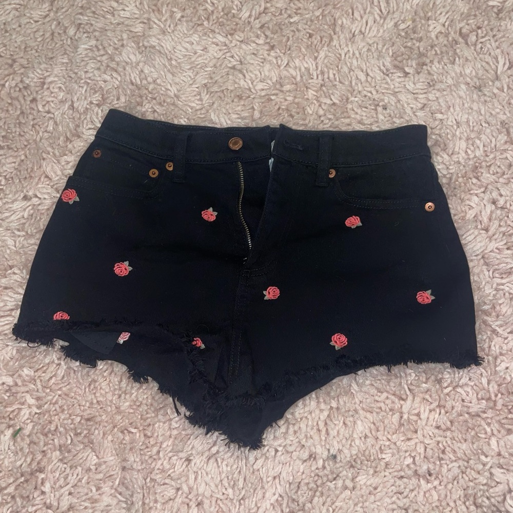 PINK shorts. Size 4. Black with pink roses.